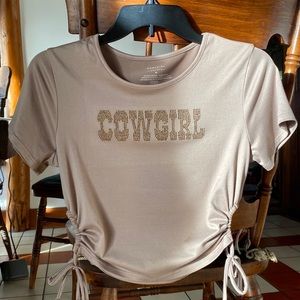 Very soft and stretchy cowgirl crop top. Adjustable side ties. Only worn twice